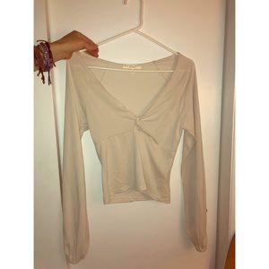 Long sleeved cream top